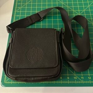 Vintage Shanghai Tang brown crossbody with orange interior